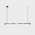 Black Clérachic linear pendant with a white silicone wave, on a round black canopy against a pale backdrop.