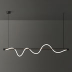 Black Clérachic linear pendant with a bright, deep wave and a black canopy, against a charcoal wall.