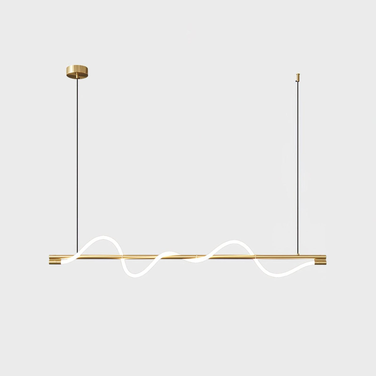 Clérachic brass linear pendant with a gentle glowing wave and a brass canopy, on a pale backdrop.