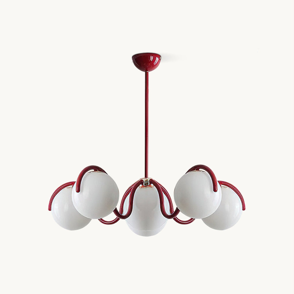 Red Clérachic chandelier on a white backdrop, with six white glass globes held on curving red arms from a slim rod.