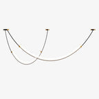 Two staggered LED bars on black cables from three gold-trimmed ceiling canopies, this Clérachic pendant shown lit on a plain white backdrop.