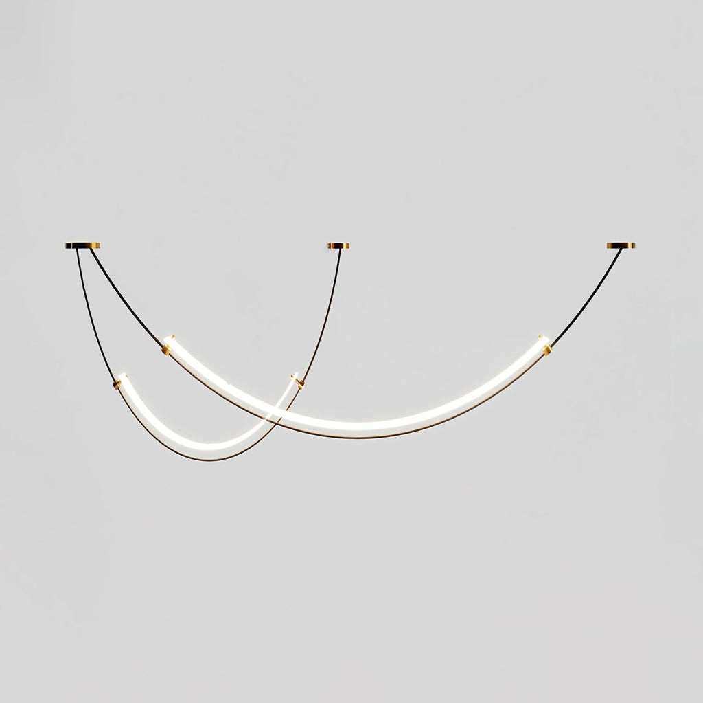 Lit Clérachic pendant on a pale grey backdrop, two staggered LED bars hung from three small canopies on thin black cables.