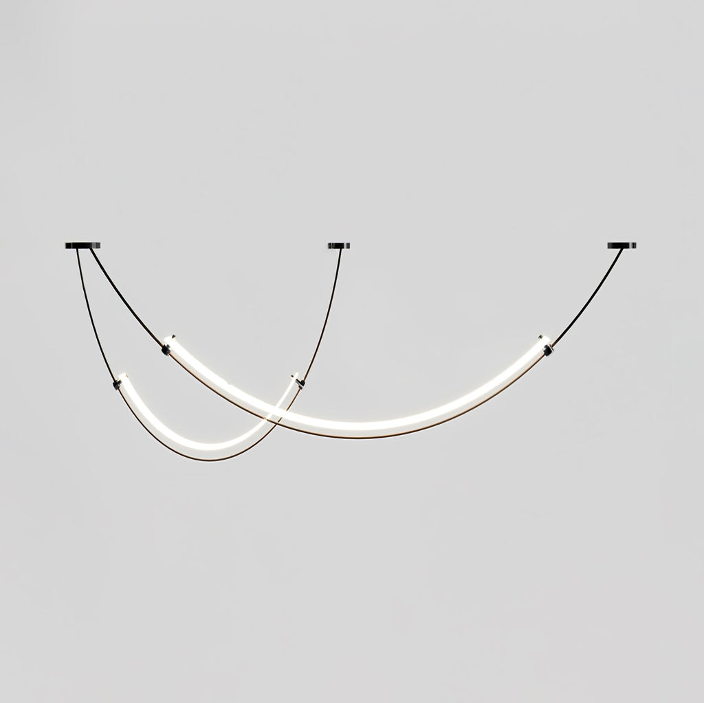 This Clérachic pendant lit against a grey backdrop, shown a little closer than before, with a gold collar at the end of each bar.