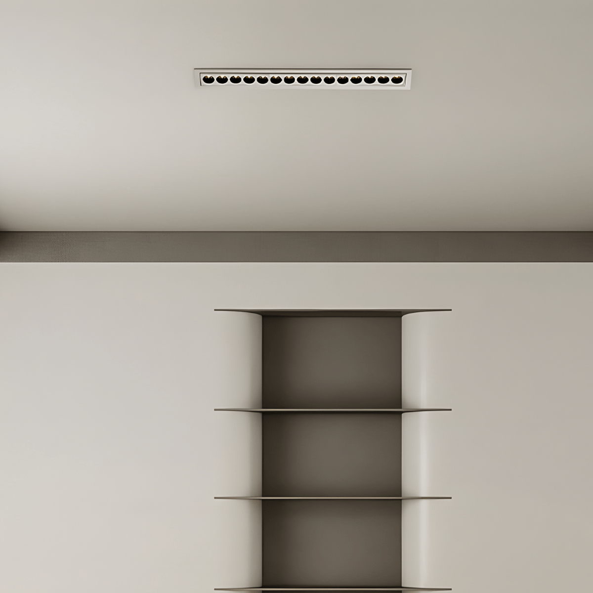 Clérachic long white recessed linear downlight with small black reflectors, centred on a plain ceiling above a metal shelving niche.