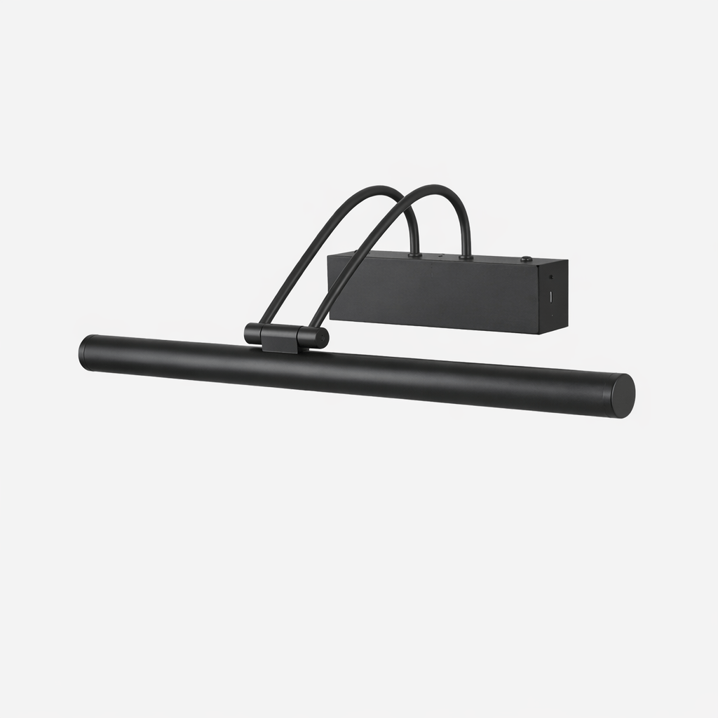 Black version of this Clérachic wall light, with its long round tube, curved double arm and boxy backplate, on a pale backdrop.