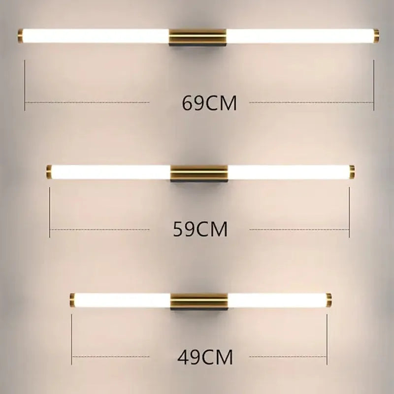 Clérachic linear wall lamp shown in all three lengths, lit and stacked one above the other, each labelled with its measurement: 69 cm, 59 cm and 49 cm.