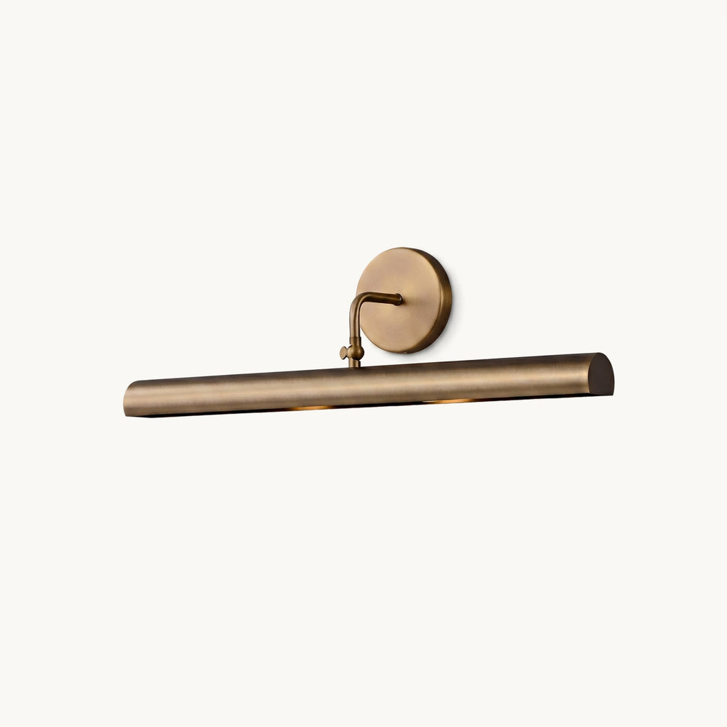 Slim bronze-finish bar light on a round backplate with a short curved arm, shown on a plain white backdrop from this Clérachic wall sconce range.