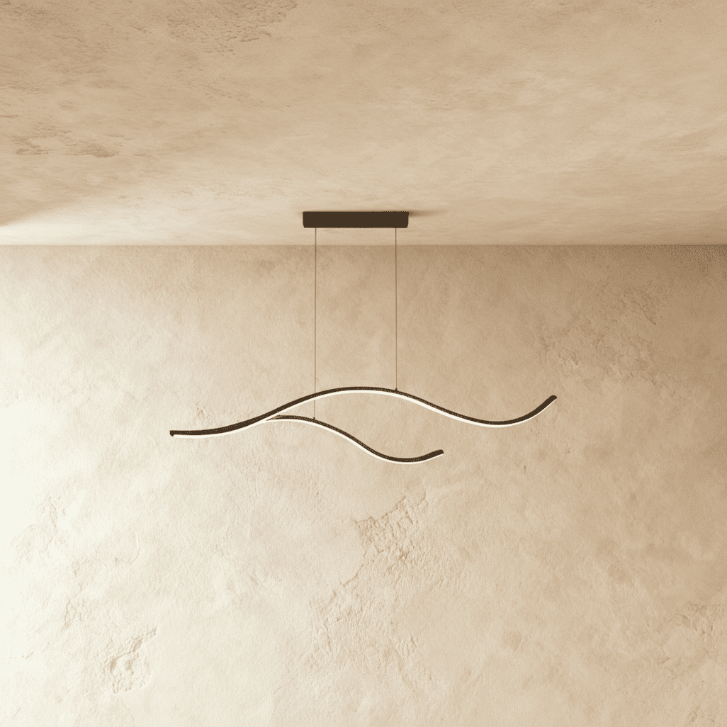 Clérachic black two-arc wavy LED pendant on twin cables, its slim silicone-lit curves glowing softly against a limewash wall.
