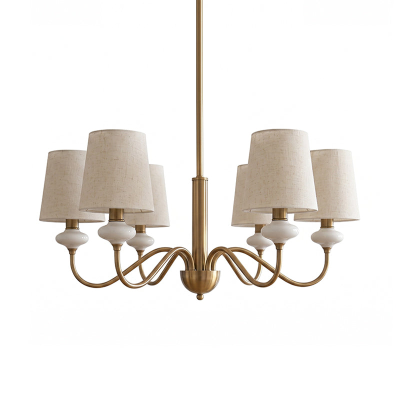 Six-light gold Clérachic chandelier with linen shades and ceramic necks, hanging from a straight rod on a white background.