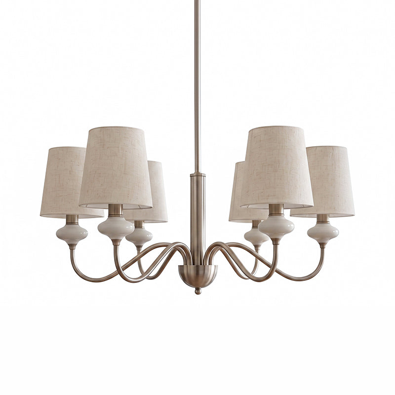 Six-light Clérachic chandelier in sand nickel with linen shades and white ceramic necks, on a white background.