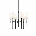 All-black version of this Clérachic six-light chandelier, its slim black arms holding six white linen shades on a plain white backdrop.