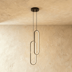 Clérachic double black oval loop pendant, two interlocked LED rings at different heights from a round black canopy.
