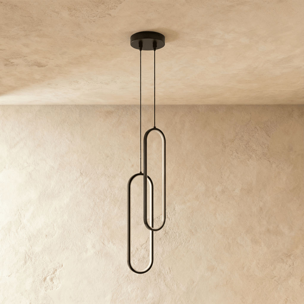 Clérachic double black oval loop pendant with two overlapping rings, unlit, on cords from a round black canopy.