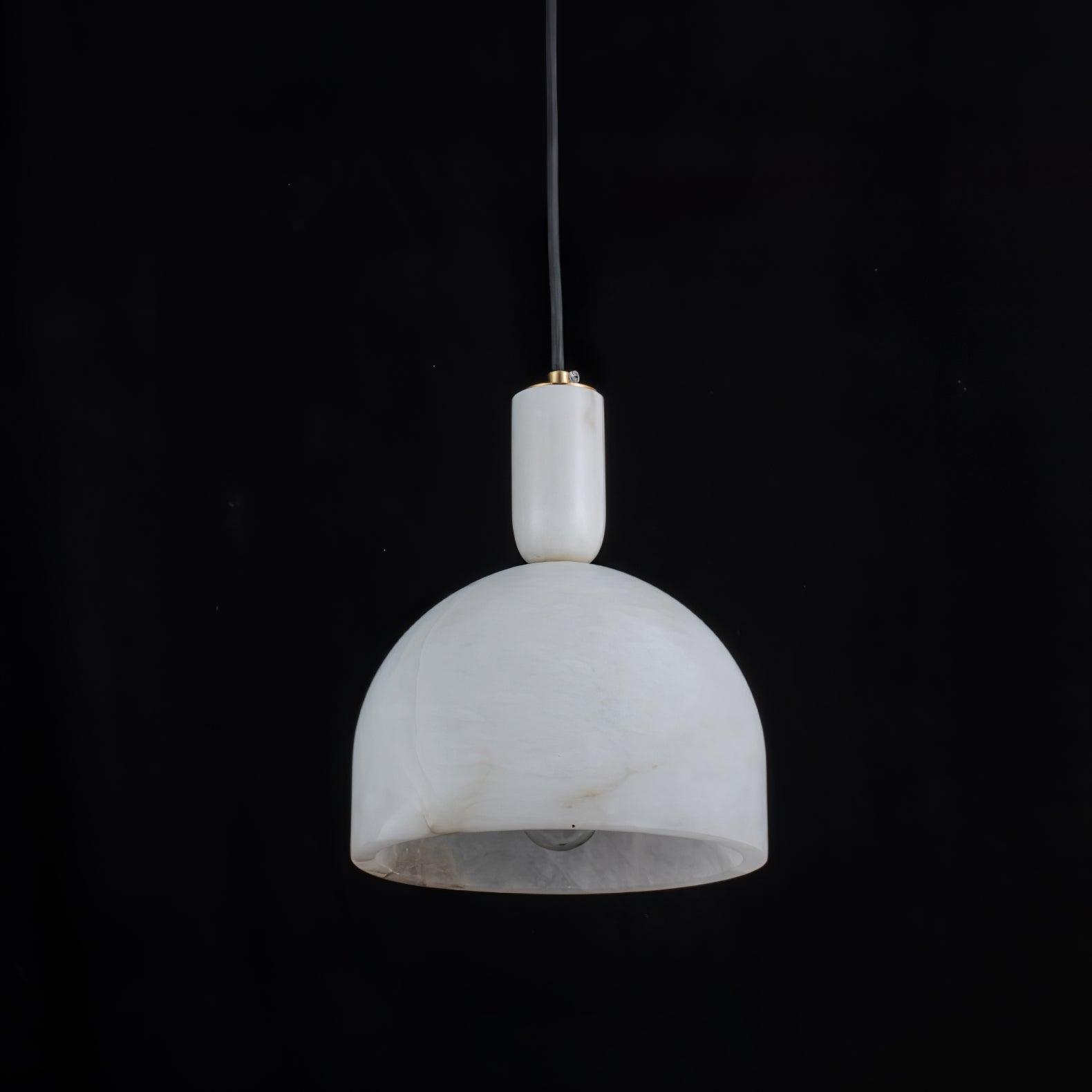 Unlit Clérachic Long-Drop Dome pendant light on black, the chalky alabaster shade cool and faintly grey-veined.