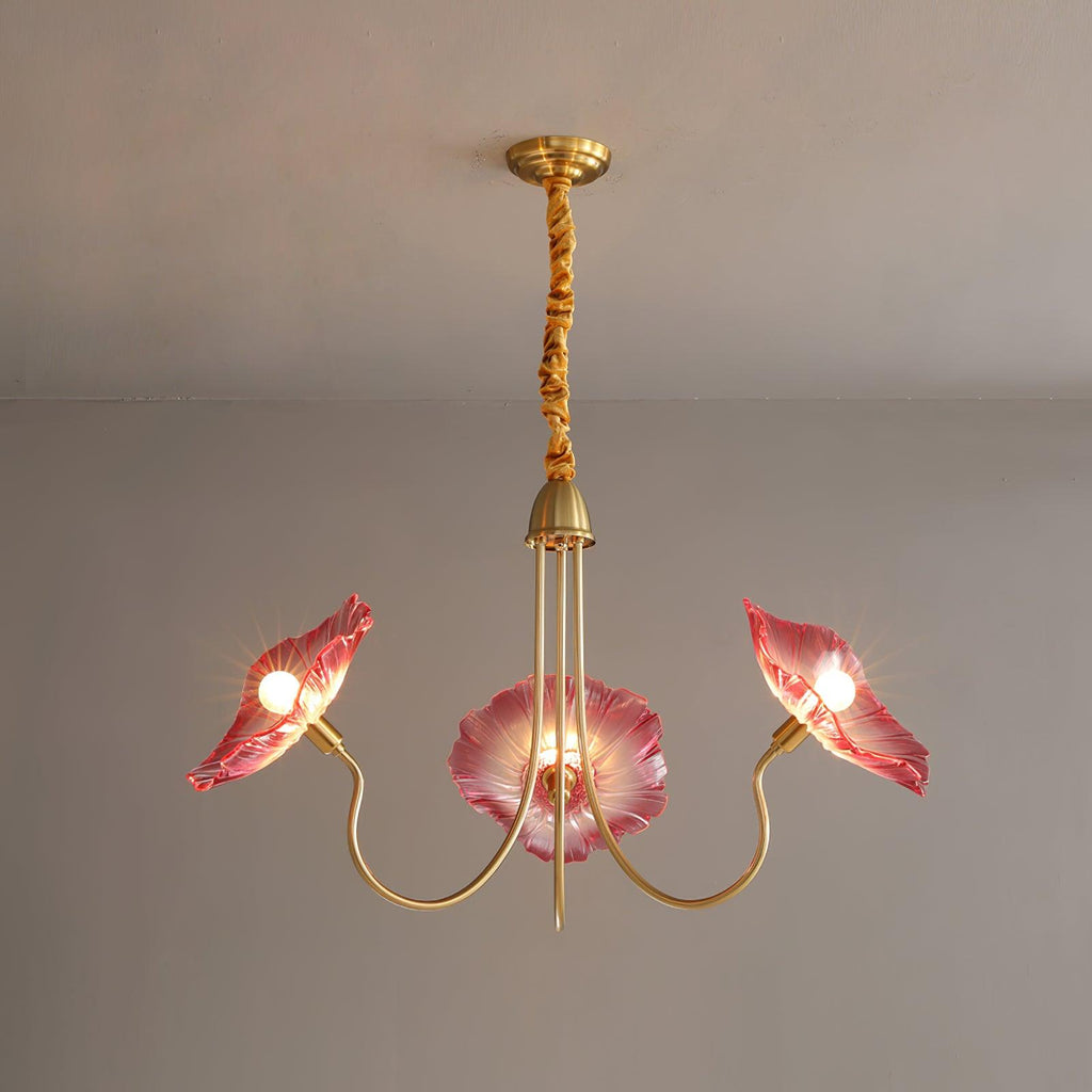 Pink glass version of the Clérachic Lotus Blossom Chandelier, 3-light, blush petal shades glowing on brass arms.