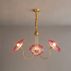 Pink glass version of the Clérachic Lotus Blossom Chandelier, 3-light, blush petal shades glowing on brass arms.