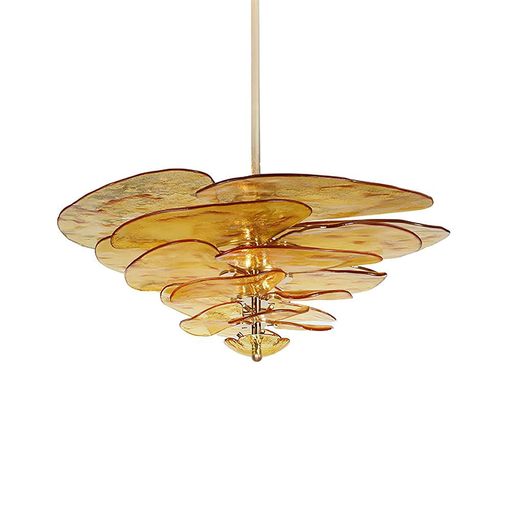 Amber Clérachic lotus leaf chandelier lit on white, the honey-gold glass glowing from the bulbs at its core.