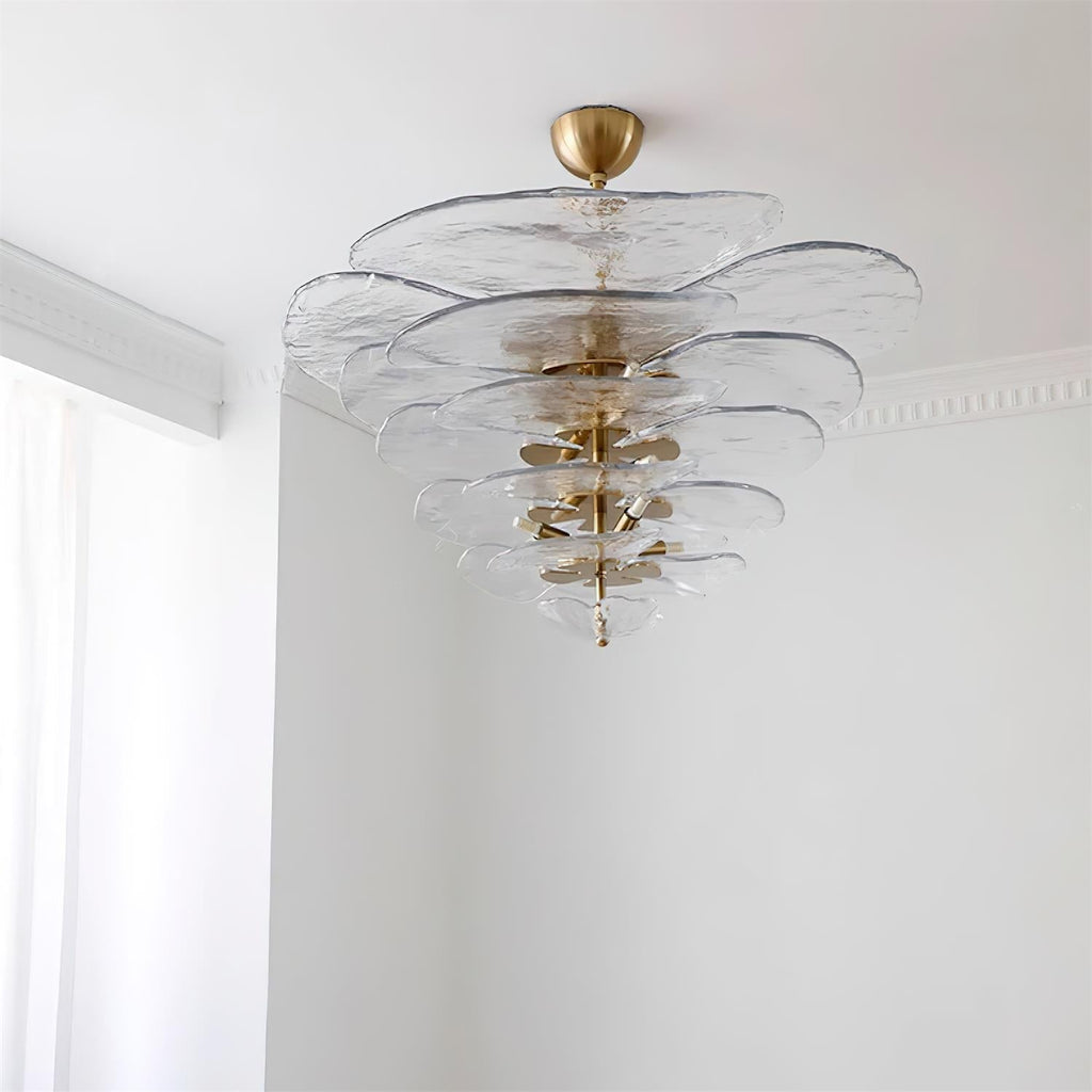 Clear Clérachic Lotus Leaf Glass Chandelier lit in a corner with white cornice moulding and daylight nearby.