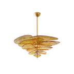Amber Clérachic Lotus Leaf Glass Chandelier on white with its full brass drop rod and domed ceiling canopy.