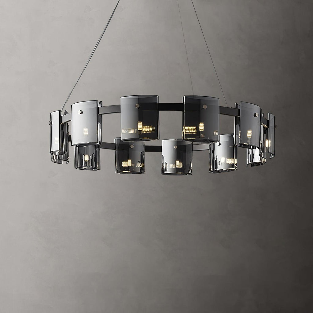 Black-frame ring chandelier from Clérachic with a double row of smoked glass shades, shown against a textured grey wall.