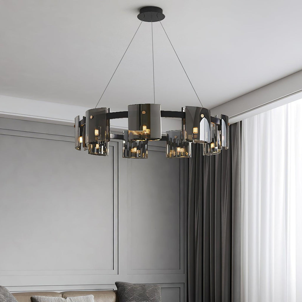 Large black-frame Clérachic chandelier with smoked glass shades hung in a room with grey panelled walls and heavy curtains.