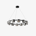 Black-frame ring chandelier from Clérachic with smoked glass shades and a round black canopy, on a clean white background.