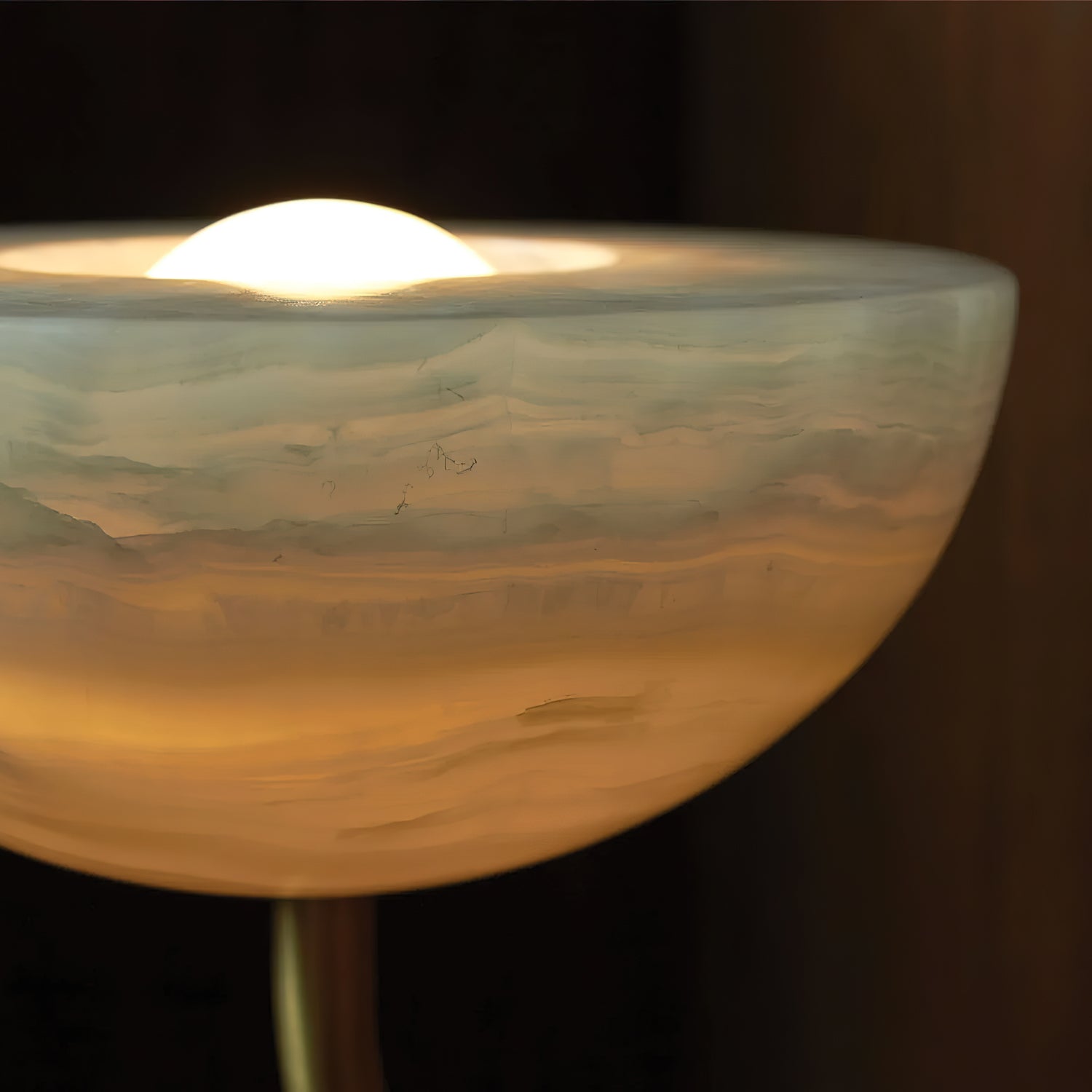 Macro of the Clérachic Lunaris bowl, warm light pooling in the veined alabaster dish.