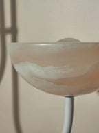 Close view of the underside of a Clérachic Lunaris bowl and its slim supporting stem.