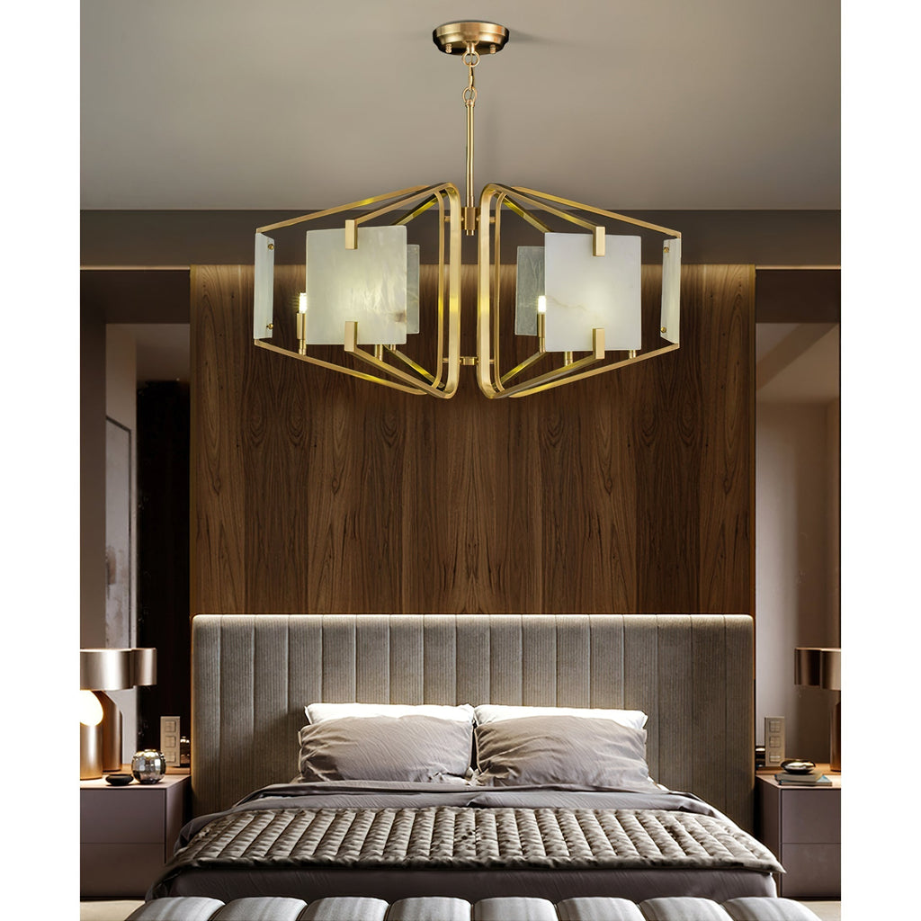 Clérachic chandelier in a bedroom, hung above a channel-tufted headboard and walnut panelled wall.