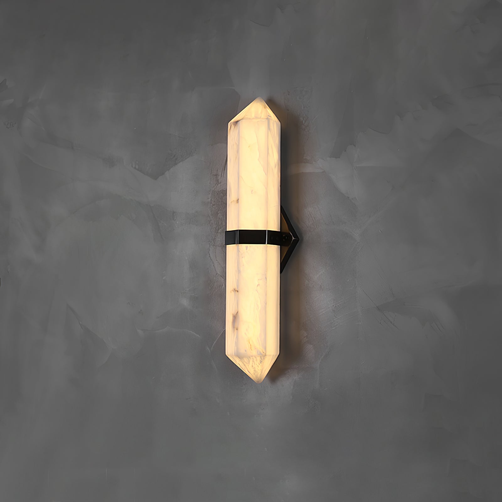 The Clérachic Lustra on concrete with a darkened centre bracket, the faceted alabaster reading soft and pale.