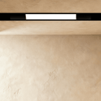 Clérachic recessed light bar, a lit panel set inside the black channel, which runs on unlit at both ends.