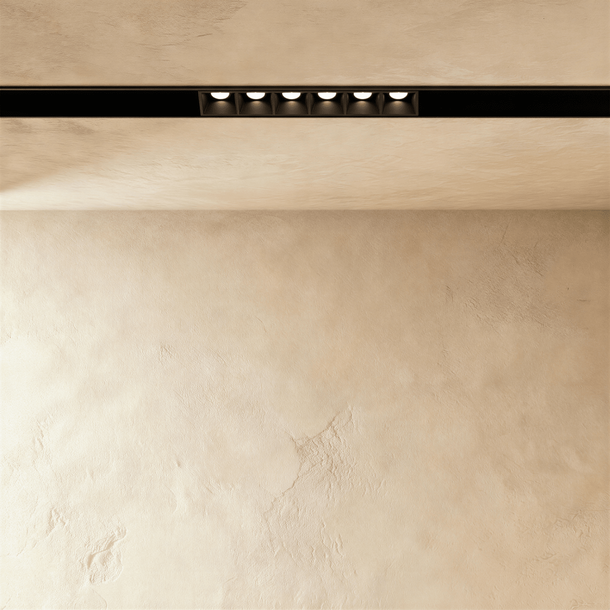 Clérachic recessed grille head, six round lenses set flush in the channel, each throwing its own beam.