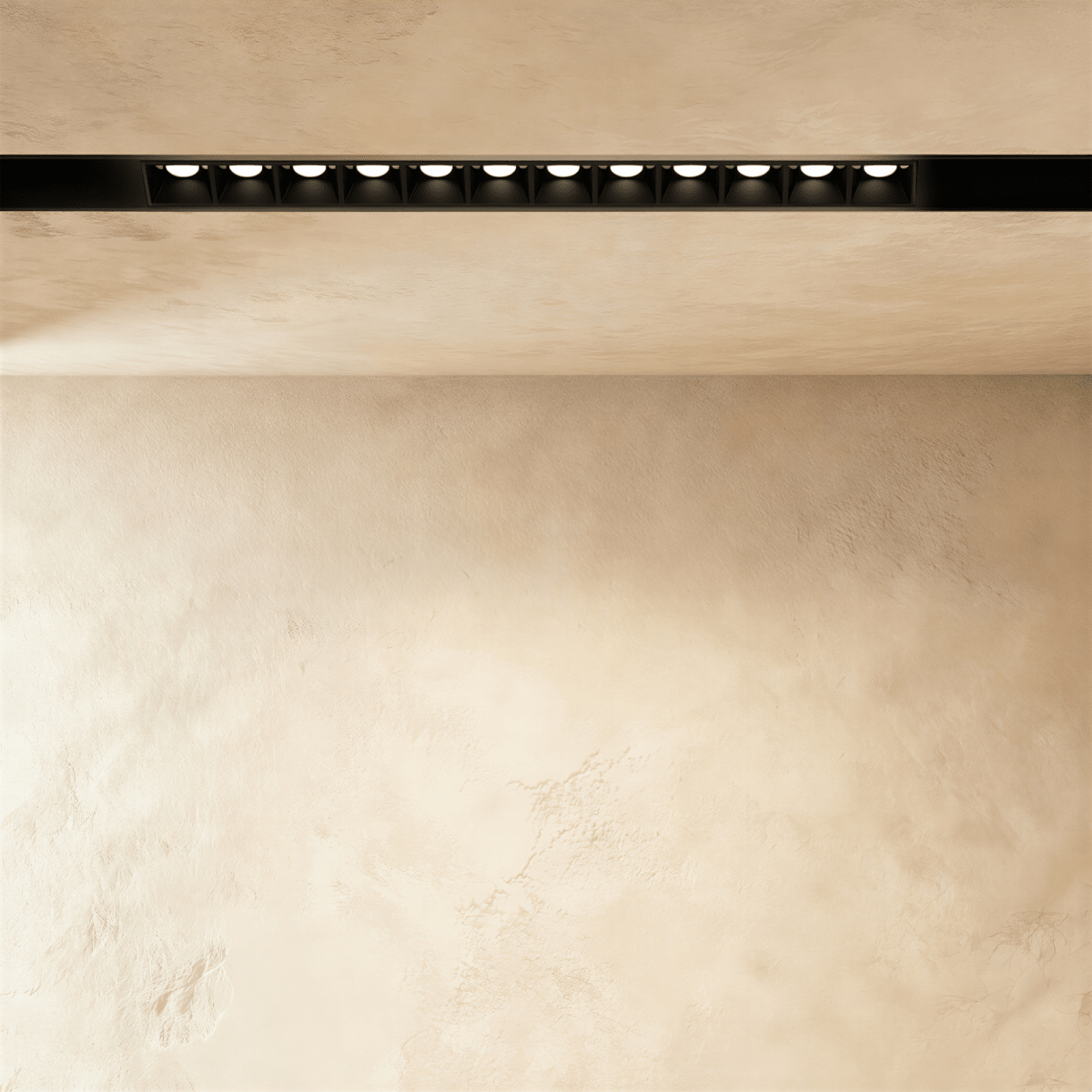 Clérachic recessed grille head in a longer size, a row of round lenses running along the black channel.
