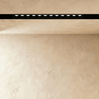 Clérachic recessed grille head shown close, the lit lenses separated by black baffles down the channel.