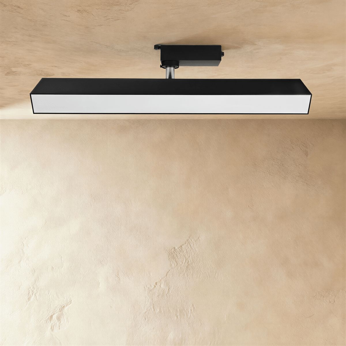 Clérachic long black linear track light with a wide frosted diffuser face, on a track adaptor and chrome stem.