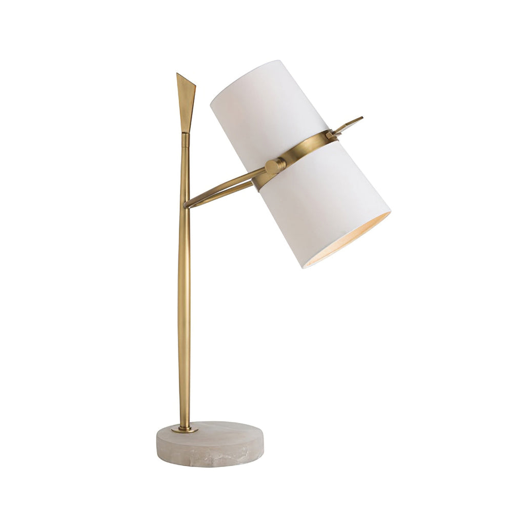 Gold Clérachic table lamp with a white shade tilted forward to show its gold-lined inside, on a pale stone-look base.