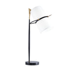 Black Clérachic table lamp with a black marble base and a tilted white shade, on a plain white background.