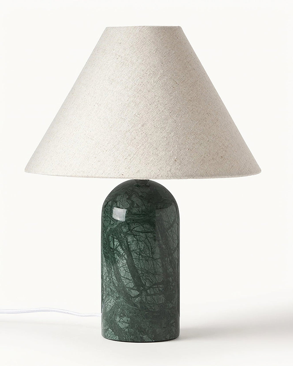 Green marble base with a large linen cone shade, this Clérachic table lamp is shown close up on a white backdrop with its white cord.