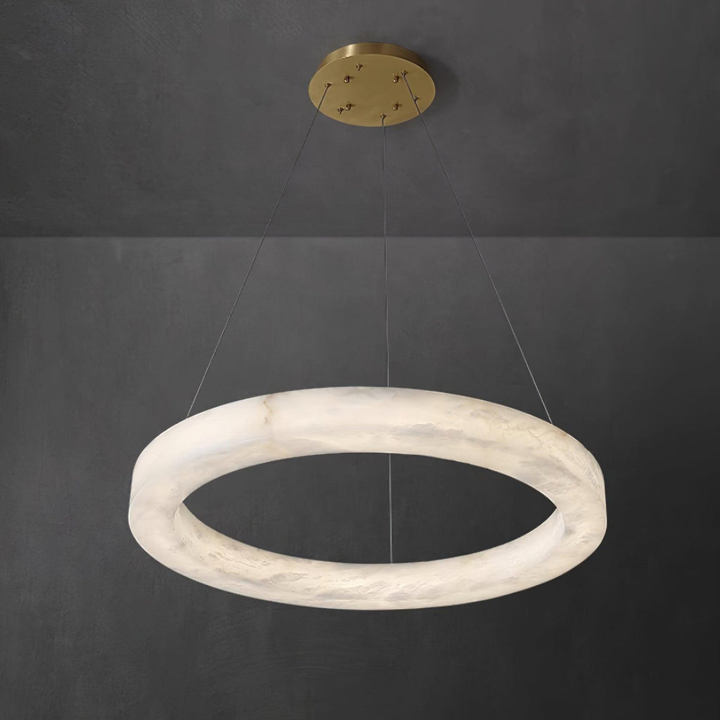 Clérachic Marika chandelier at its widest, a slim alabaster ring on fine cables.