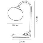 Dimension drawing of the marshmallow table lamp, in outline against white.