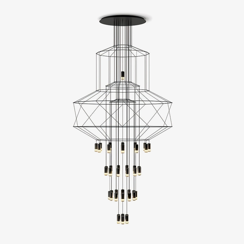 Clérachic wire-frame chandelier with stacked black polygon frames and cylindrical LED drops, hung from a round ceiling plate on a plain white backdrop.