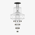 Clérachic wire chandelier with stacked black frames and many LED drops, hanging from a wide round canopy on a pale grey backdrop.