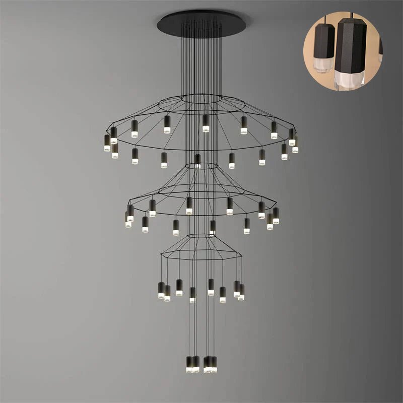 Tiered Clérachic wire chandelier on a grey backdrop, with a round inset in the corner showing the black drop fittings.