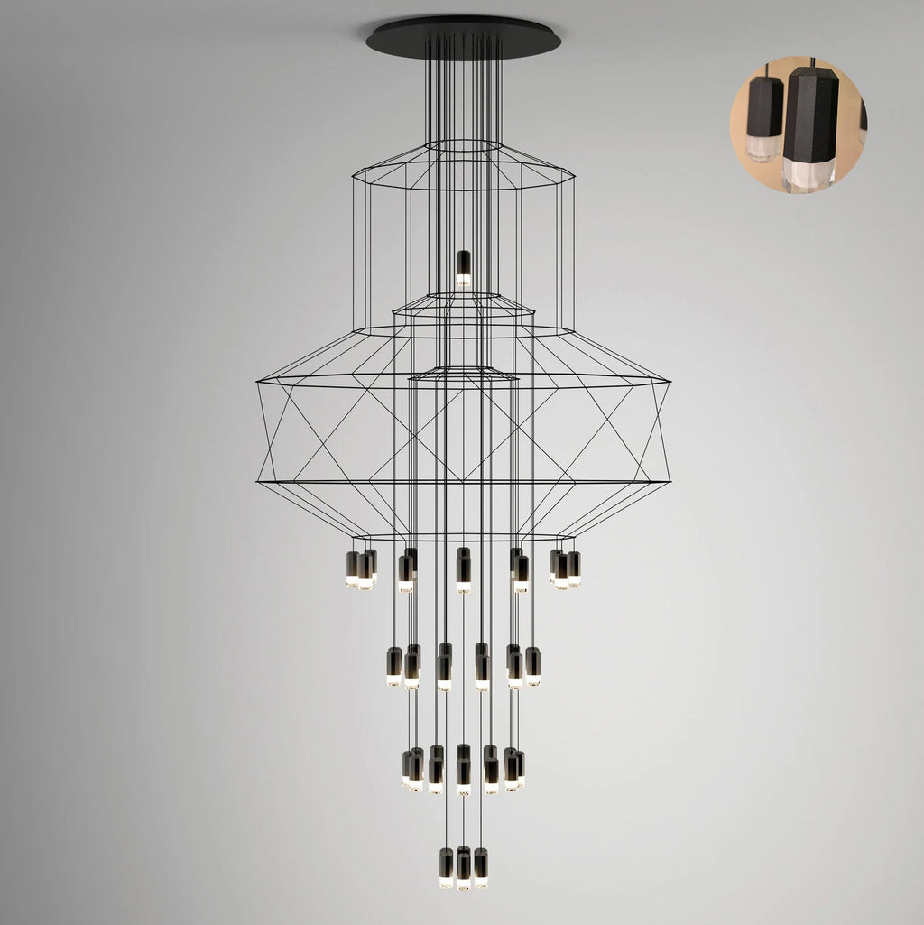 Clérachic stacked-frame wire chandelier on a grey backdrop, with a small round inset showing two black LED drops.