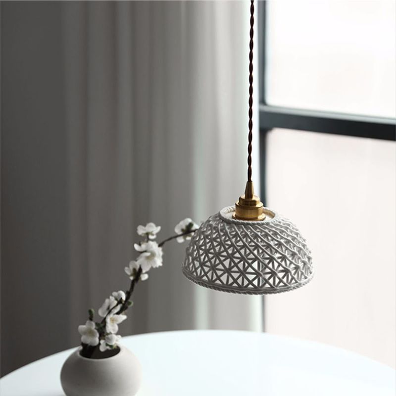 Detail of the Clérachic pendant light — the shade, the frame and the join.