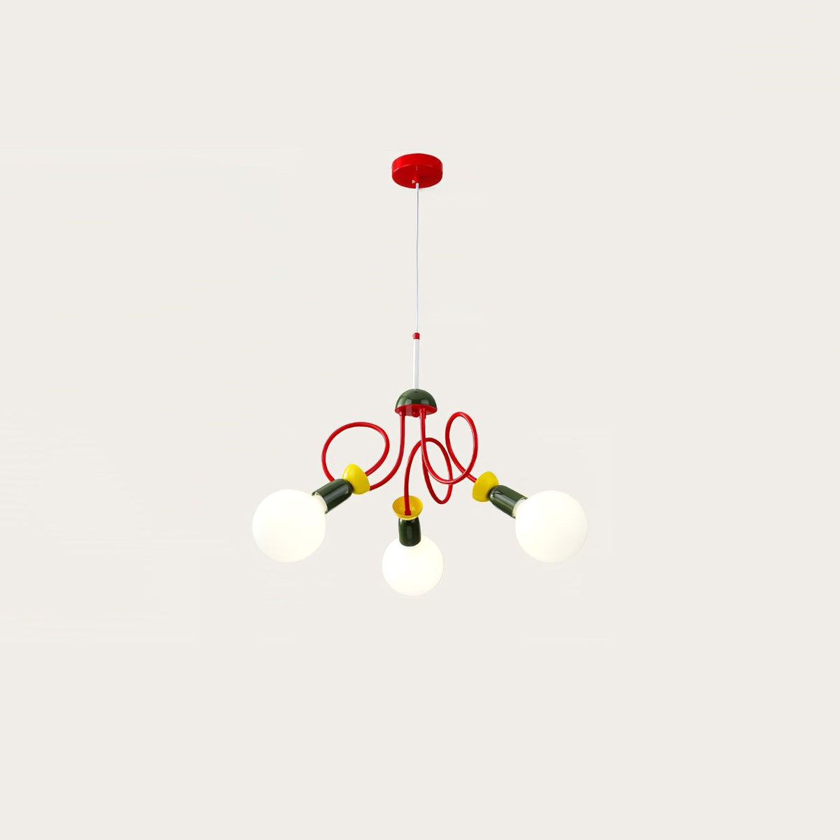 Three-head Clérachic pendant on a red ceiling plate and thin cord, with glowing globes on a plain warm-white backdrop.