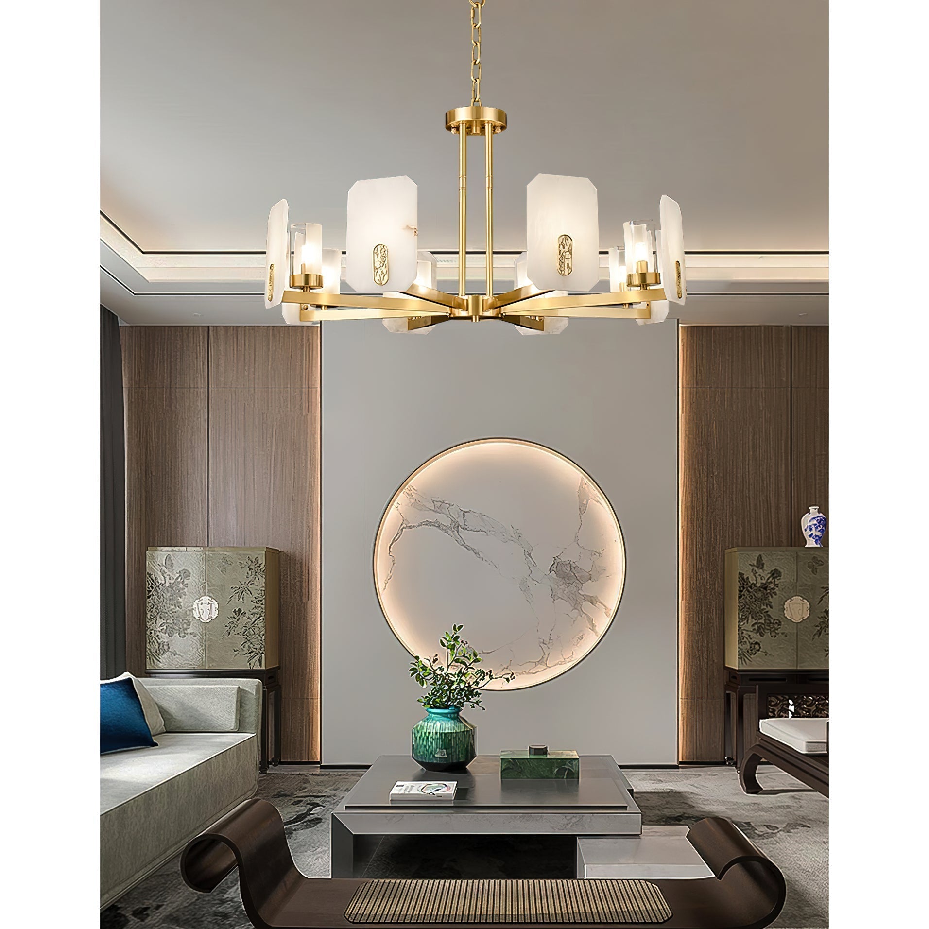 The Clérachic Meridian Alabaster Chandelier in a panelled living room, floating above a round backlit marble moon panel.