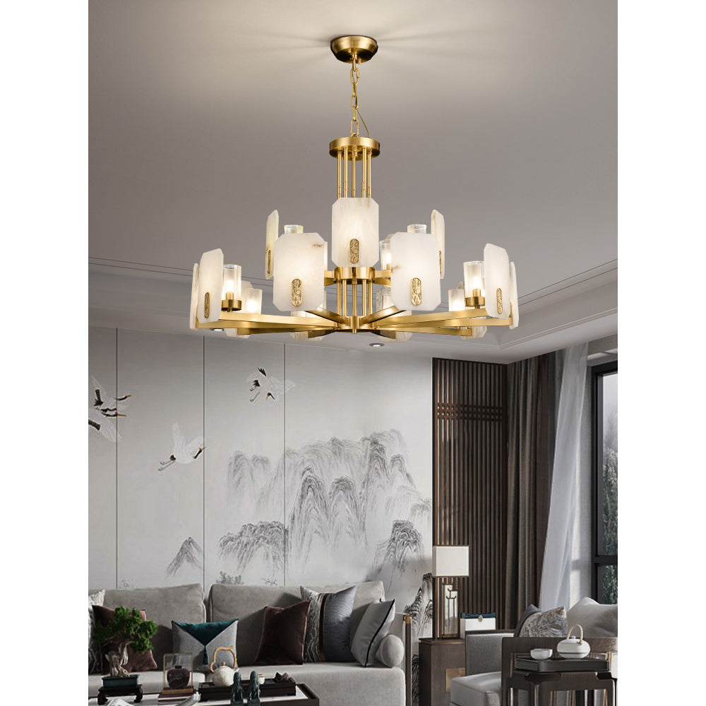 Fifteen-light Clérachic Meridian Alabaster Chandelier lit over a living room, both tiers glowing against a crane-and-mountain mural.