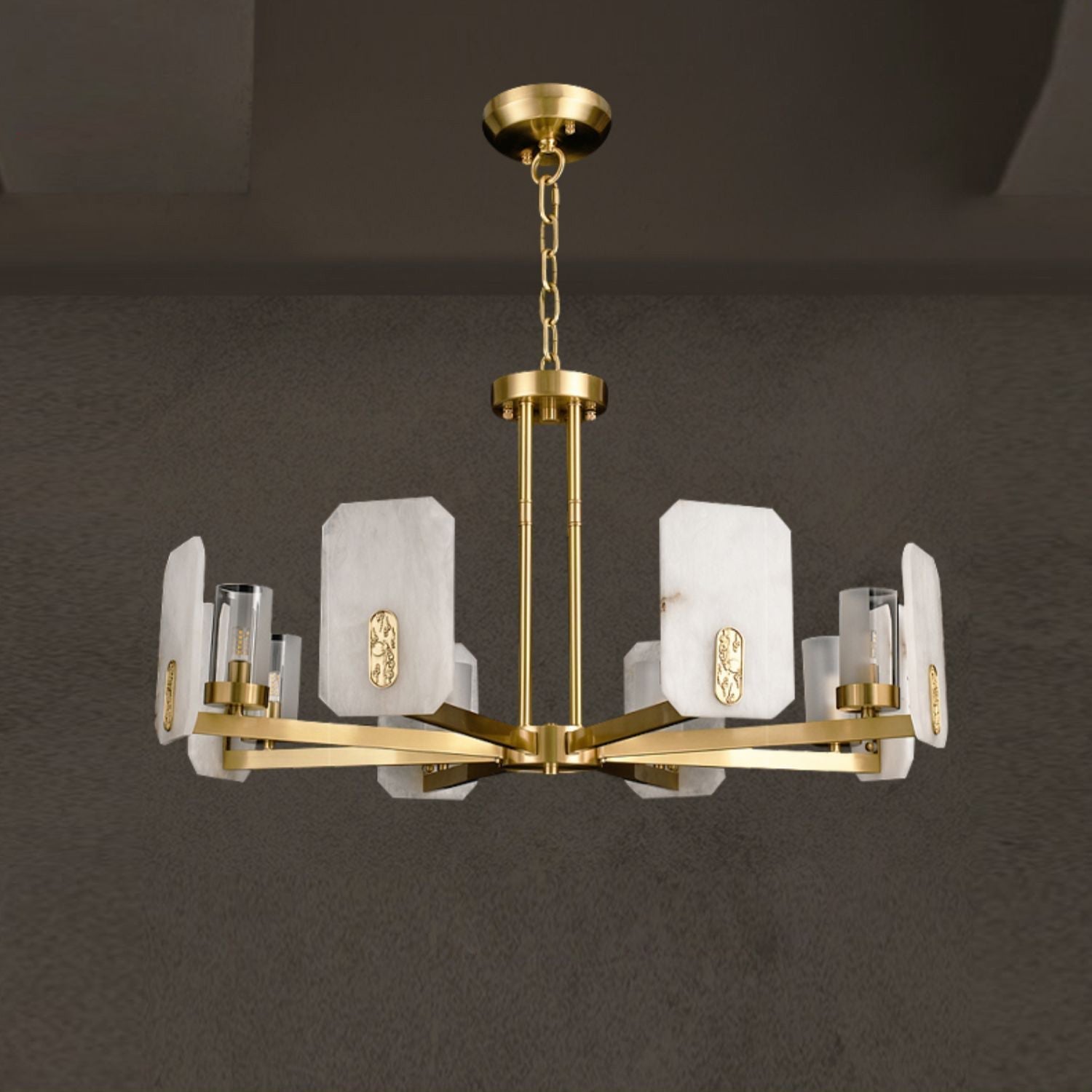 Clérachic Meridian Alabaster Chandelier against a warm taupe backdrop, showing the brass canopy, chain and radial spoke frame.