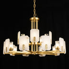 Clérachic Meridian Alabaster Chandelier, fifteen lights lit on black, seen from below so both tiers of alabaster read at once.